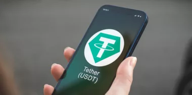 Tether logo on phone screen