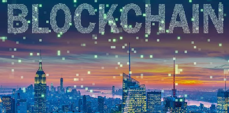 Blockchain concept with a skyline background