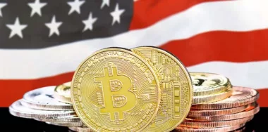 Bitcoins on American flag background