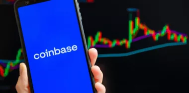 Coinbase logo on phone screen