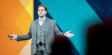 Dr. Craig Wright on a stage