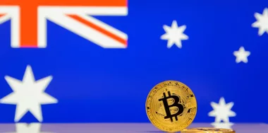 Golden Bitcoin cryptocurrency with flag of New Zealand