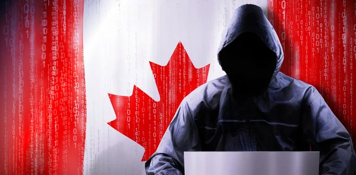 Anonymous hooded hacker, flag of Canada
