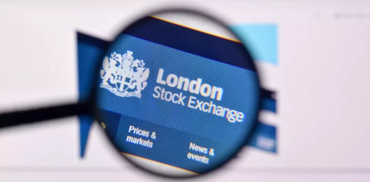 Magnifying glass over London Stock Exchange website homepage