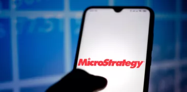 Microstrategy logo on phone screen