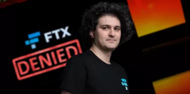 Sam Bankman-Fried with denied text and FTX background