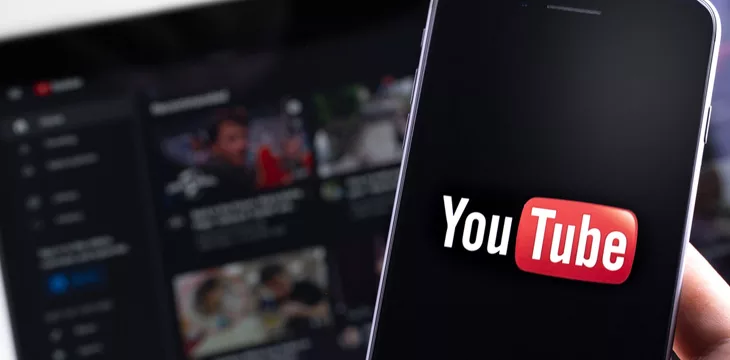 Youtube displayed on smartphone screen and on computer screen