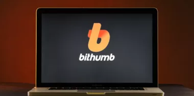 Bithumb logo on laptop