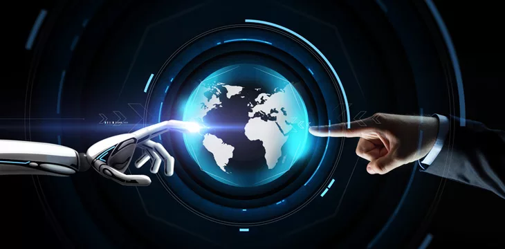 Human and robot hand with virtual earth hologram