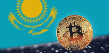 Gold Bitcoin on background of Flag of Kazakhstan