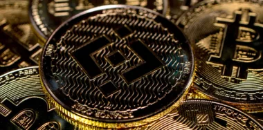 Coin cryptocurrency binance on bitcoins background
