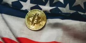 Close up shot of Bitcoin on American flag