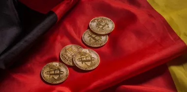 Golden bitcoins on german flag