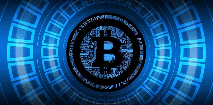 Bitcoin logo on digital background