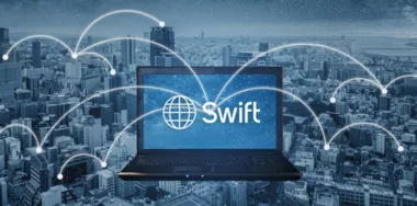 SWIFT logo on laptop screen