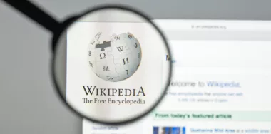 Wikipedia website with a magnifying glass