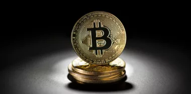Bitcoin gold coin in black background