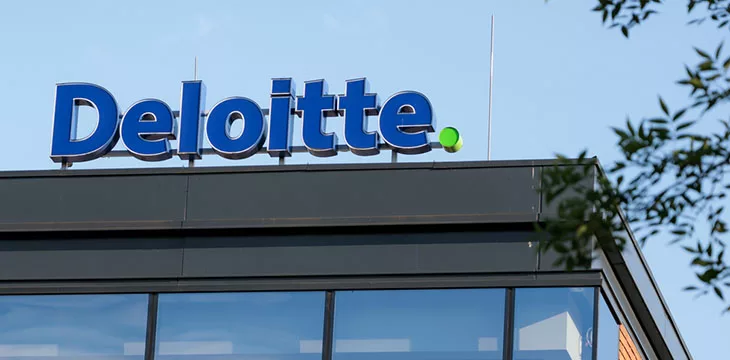 Deloitte logo on top of a building