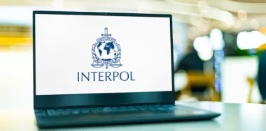 Interpol logo on a laptop