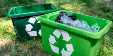 Green recycling boxes with plastic trash
