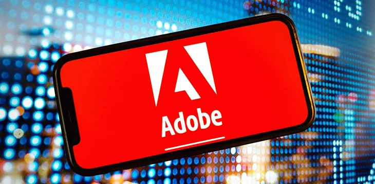 Adobe Inc company logo displayed on mobile phone screen