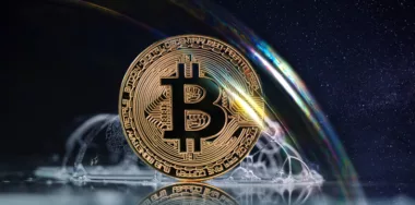 Physical Gold Bitcoin Coin in a Huge Soap Bubble