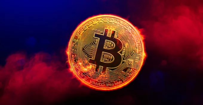 Burning golden bitcoin coin in red smoke background