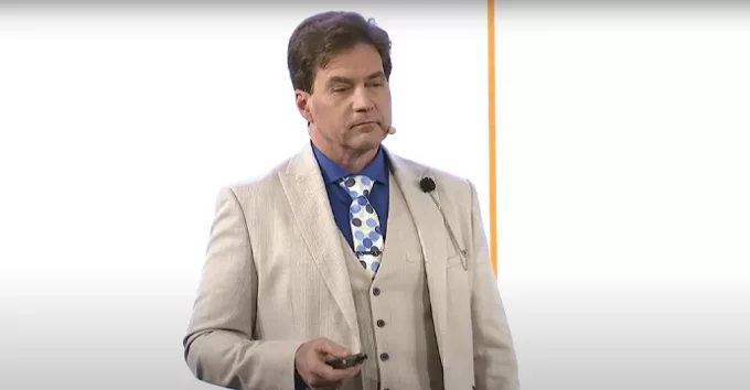 Dr. Craig S. Wright in white suit