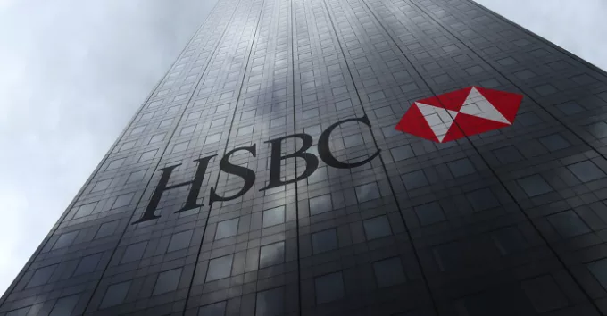 HSBC logo on a skyscraper facade reflecting clouds