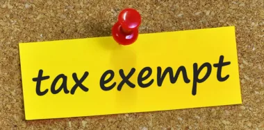 Tax exempt word on yellow notepaper