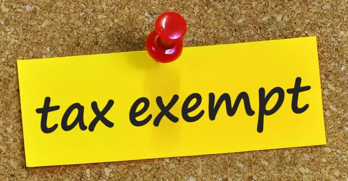 Tax exempt word on yellow notepaper