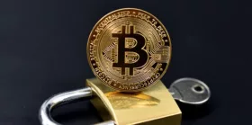 Metal padlock with bitcoin