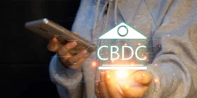 CBDC projecting on a man's hand