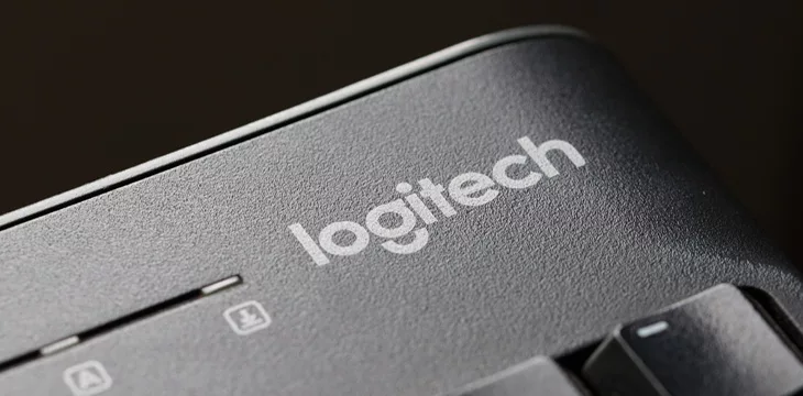 Logitech company brand logo in a modern black keyboard
