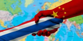 Handshake between Thailand and China flags