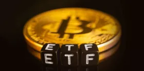ETF and coins on black with reflection
