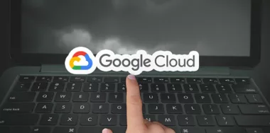 Google Cloud logo with laptop background