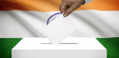 Ballot box with India flag on background