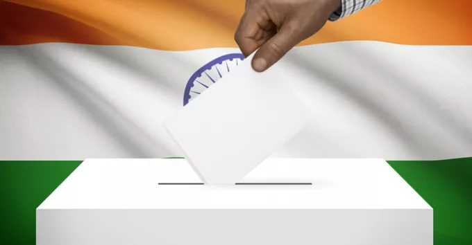 Ballot box with India flag on background