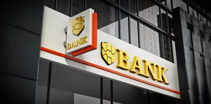 Bank signboard with fictitious logo on building