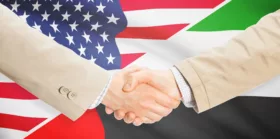 Businessmen handshake - US and UAE