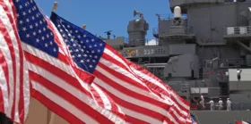 US Flags Flying Beside the Battleship Missouri memorial