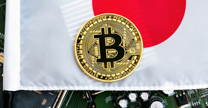 Gold coin with the national flag of Japan