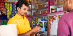 Man paying using credit card