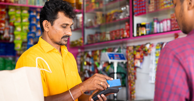 Man paying using credit card