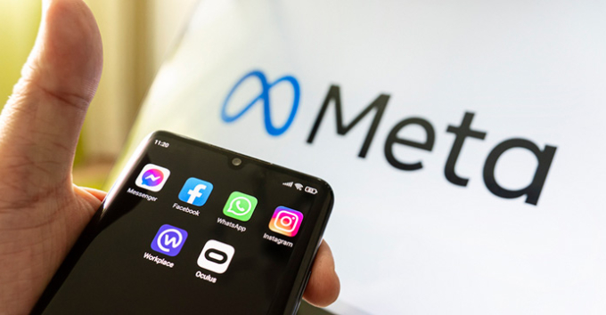 Meta logo with mobile phone