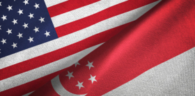 United States and Singapore flags together textile cloth