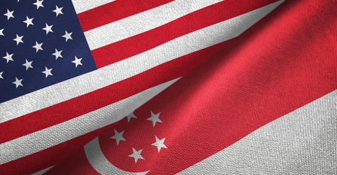 United States and Singapore flags together textile cloth