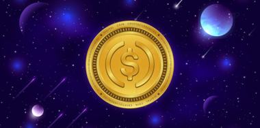 USDC coin with digital background