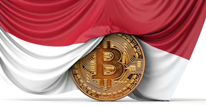 Indonesia flag draped over a coin